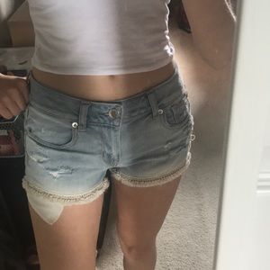Denim shorts with lacy detail